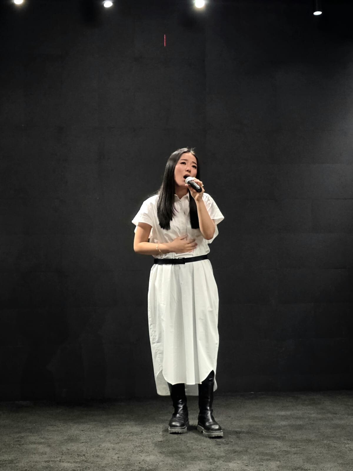 Hyojung Jung performing vocally at the Saudi Film Festival